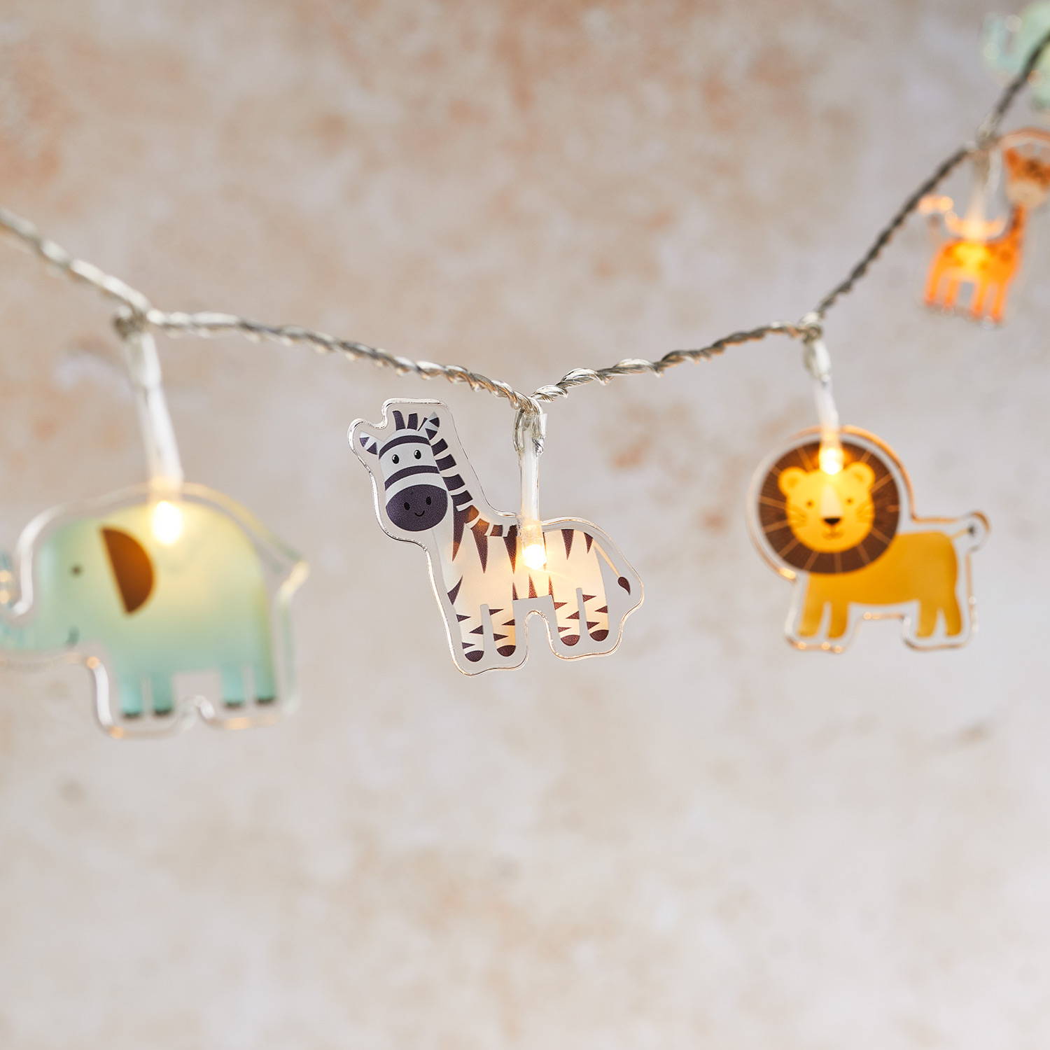 Safari fairy lights with elephants, zebras, lions and giraffes.