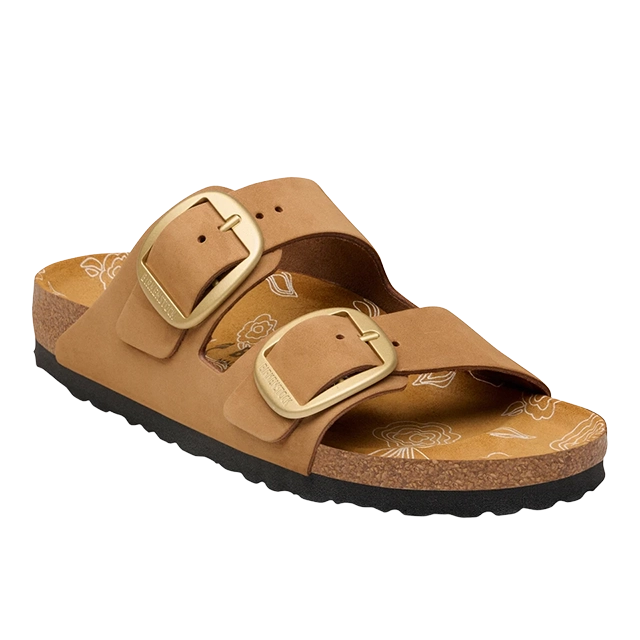 Brown buckle sandals with cork sole and tan straps.