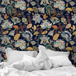 An abstract botanical print wallpaper on a bedroom accent wall.