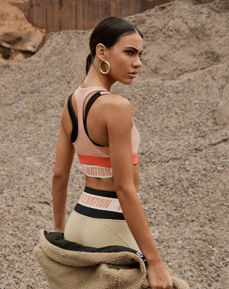 Girl in a quarry wearing activewear