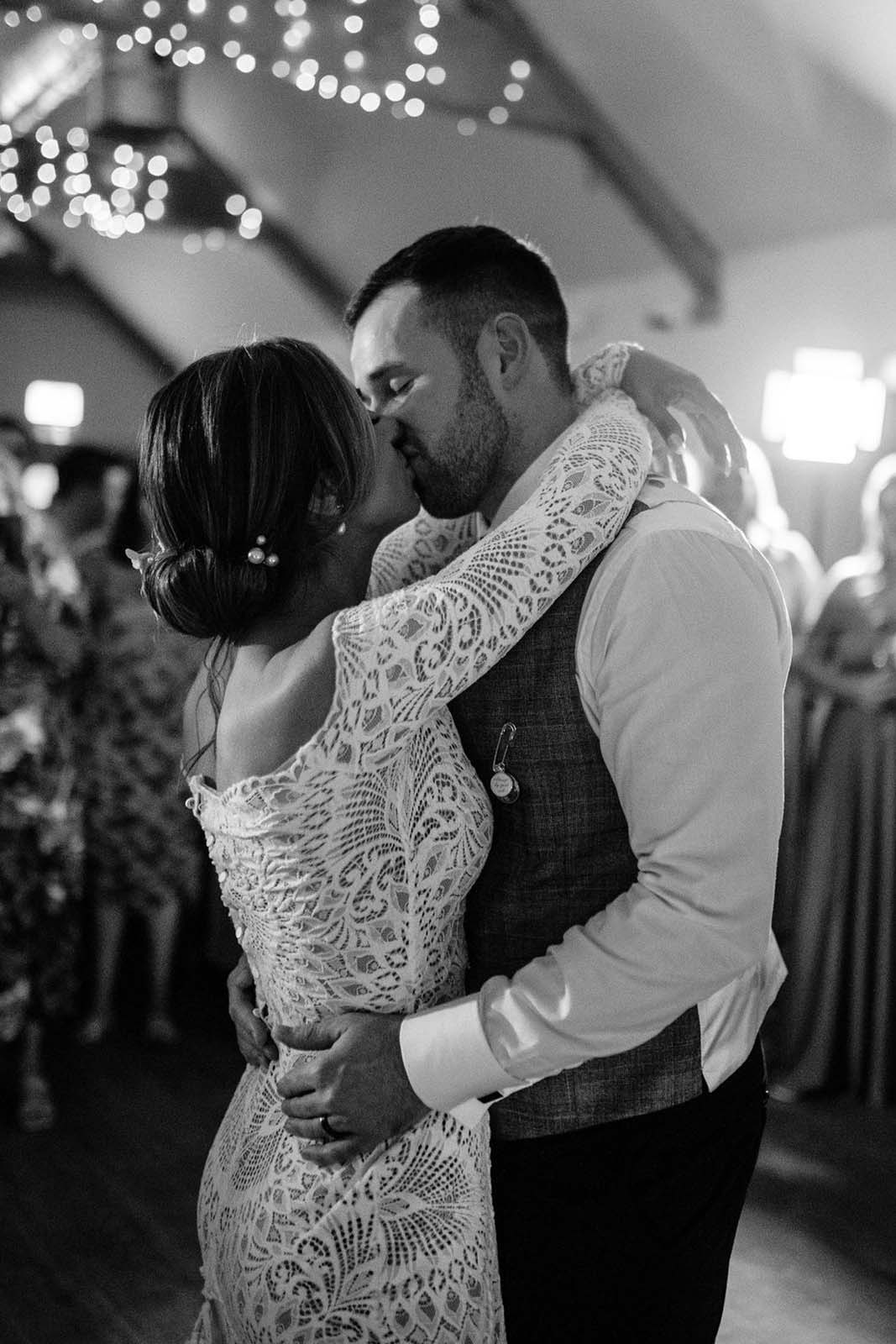 Bride and groom, sharing their first romantic dance