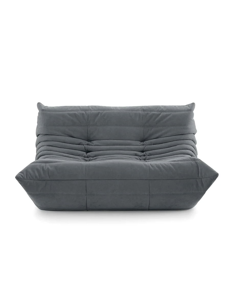 Grey modern Togo sofa by Ligne Roset with a tufted design and unique shape.