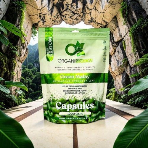 Organic supplement capsules package against a tropical background with green leaves.