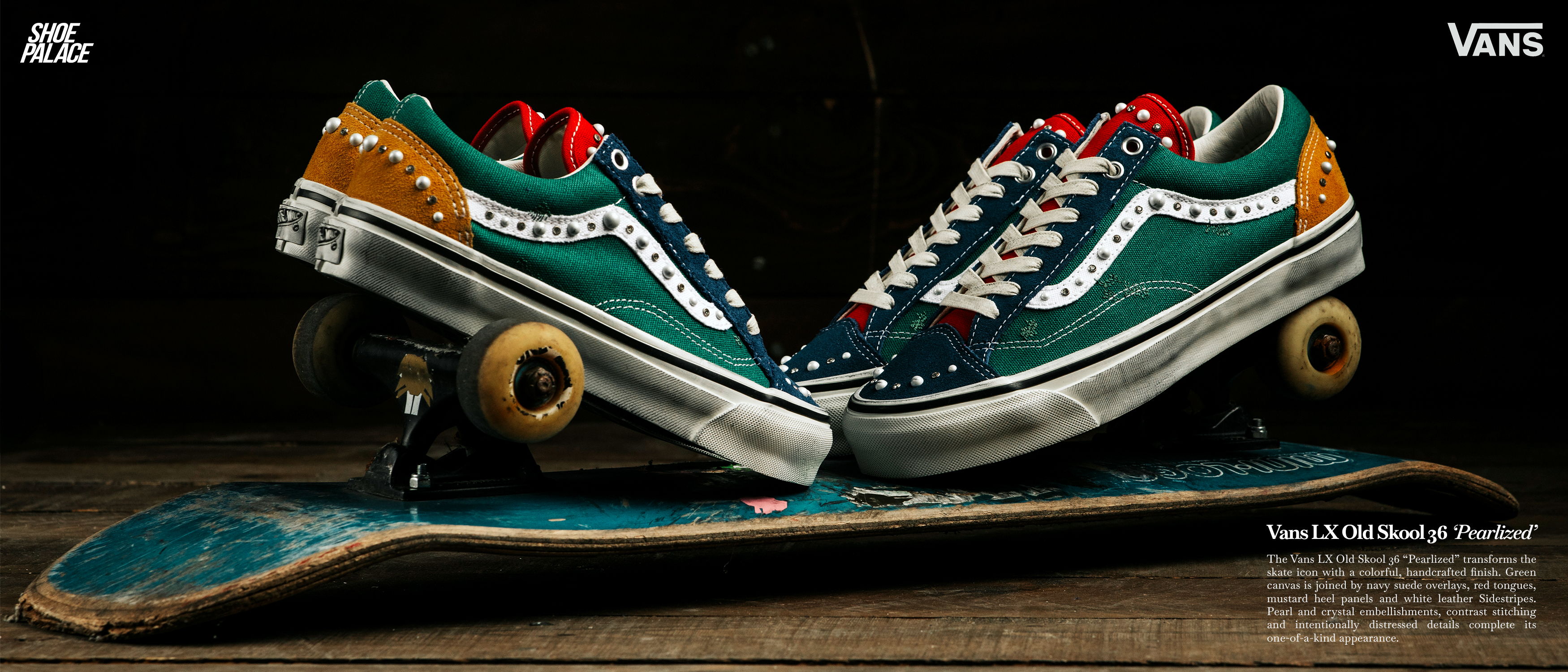 A pair of colorful Vans shoes on a skateboard.