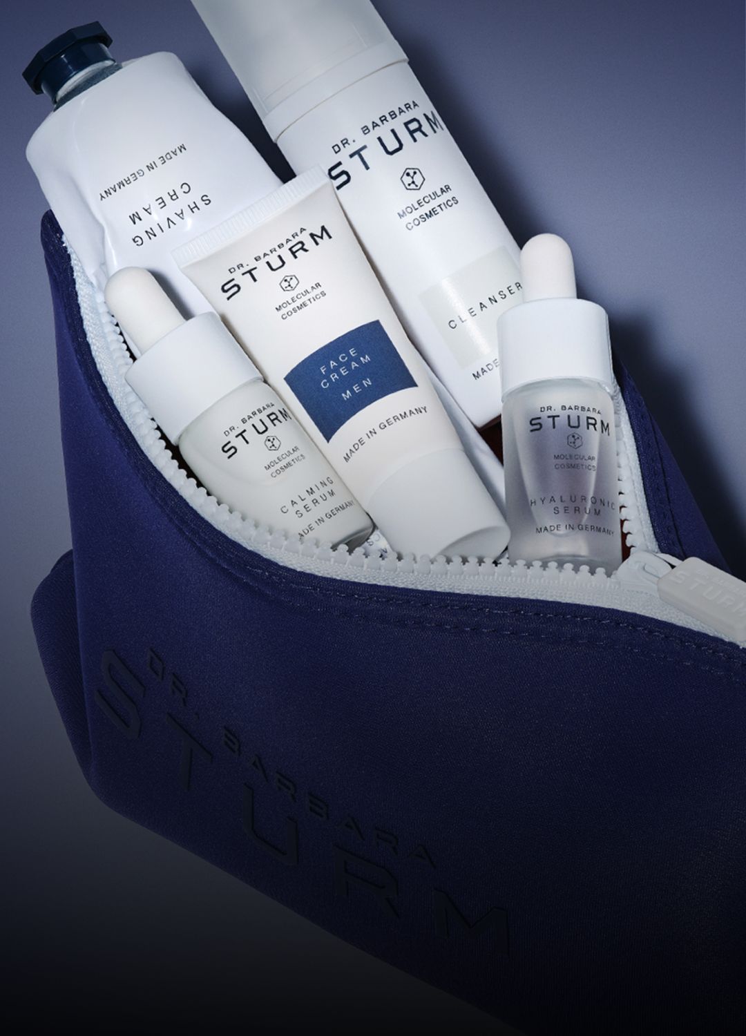 A cosmetic bag containing various skincare products from a brand.