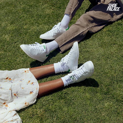 topview of female and male model weearing adidas stan smiths