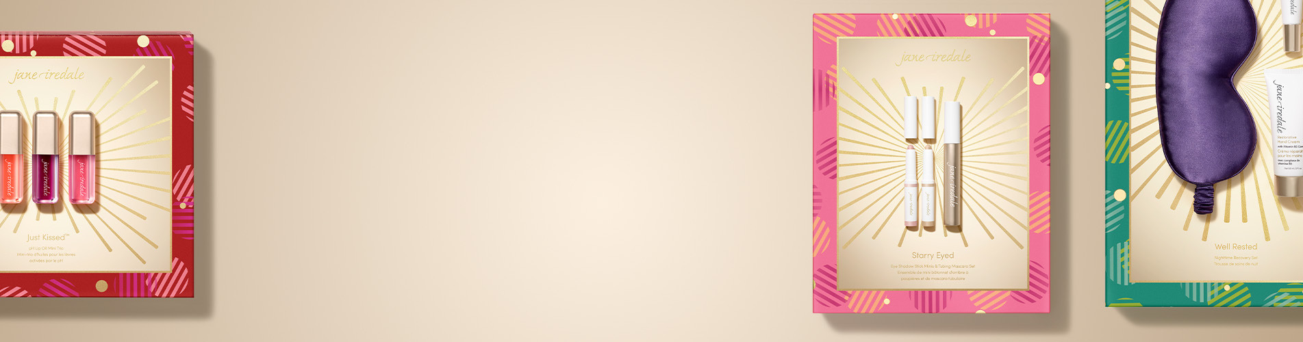 Colorful framed artwork featuring beauty products on a neutral background.