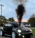 Front view of black 2000 Volkswagen Beetle with hood stack smoke and Outlaw train horn setup featured customer install gallery photo 1