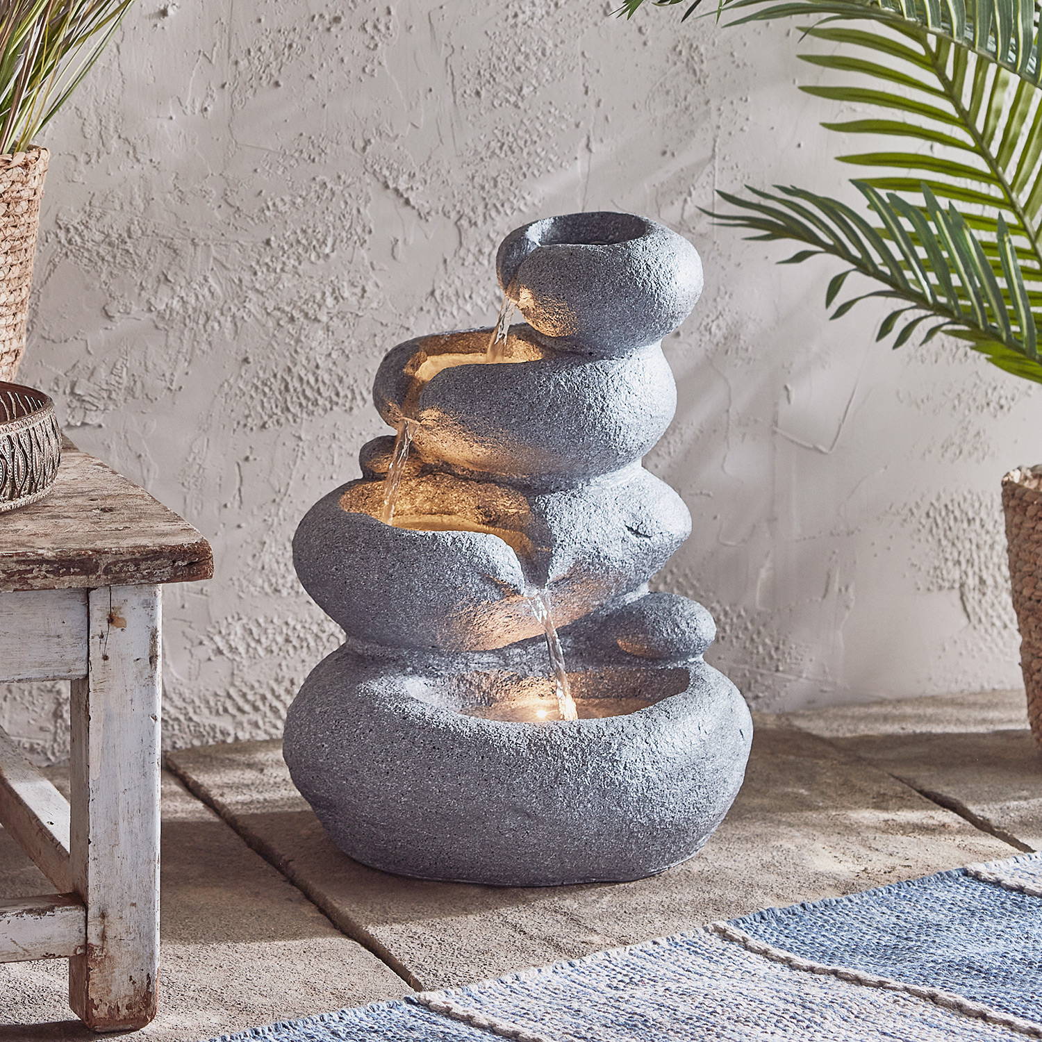 Outdoor water feature, illuminated with lighting
