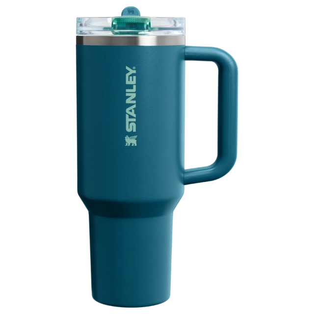 A blue insulated travel mug with a handle and transparent lid.
