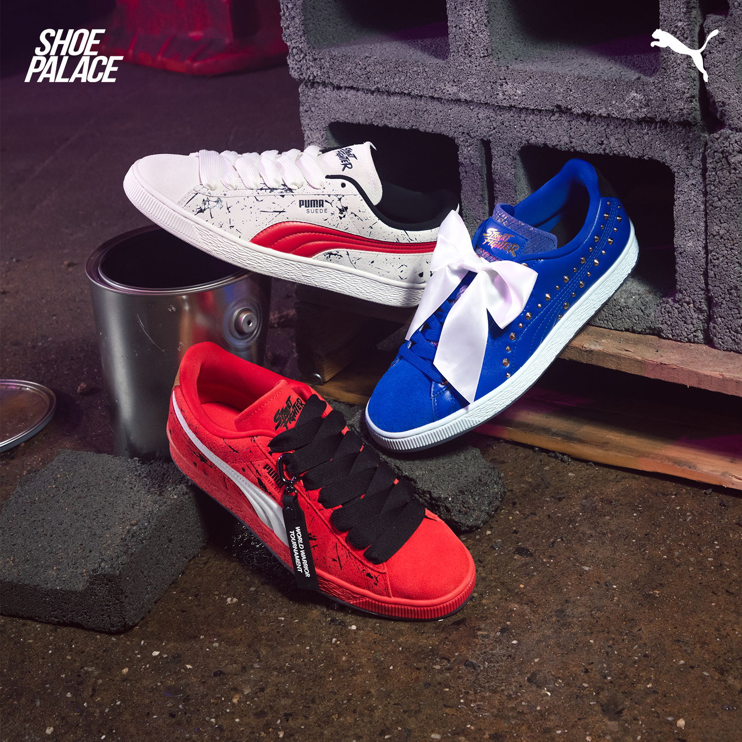 Three pairs of colorful sneakers on a textured surface.