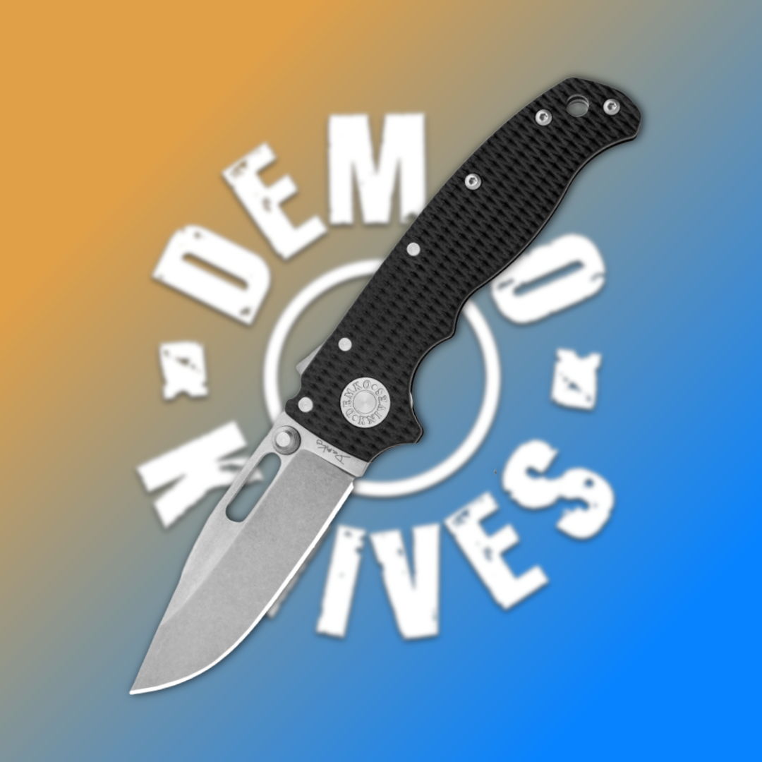 A folding knife on a colorful background with 