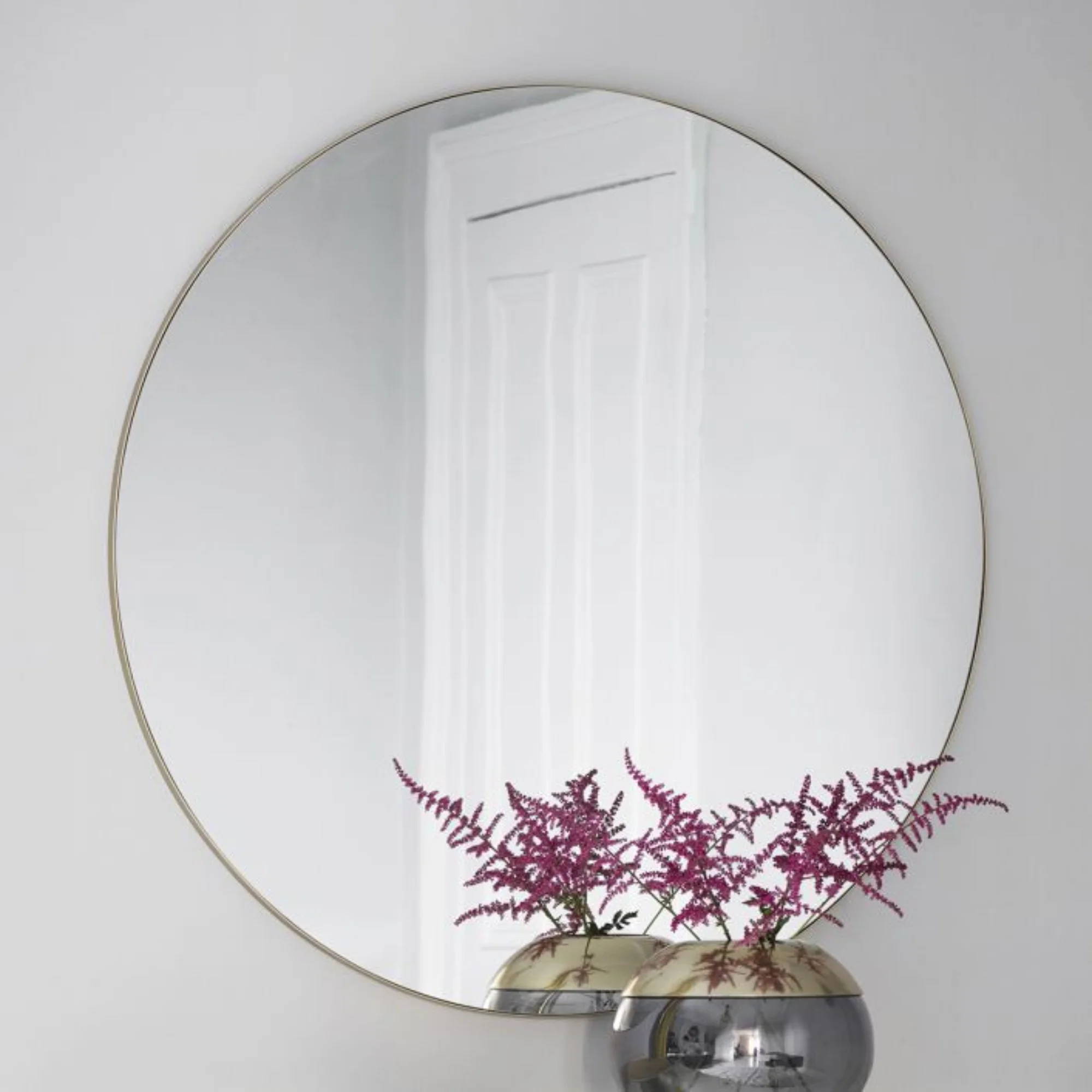 Fitz 100cm round mirror with champagne metallic frame | MalletandPlane.com