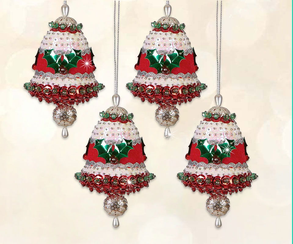 Four decorative Christmas bells in red, green, and white hanging from a background.