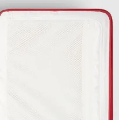 White mattress with a red border.