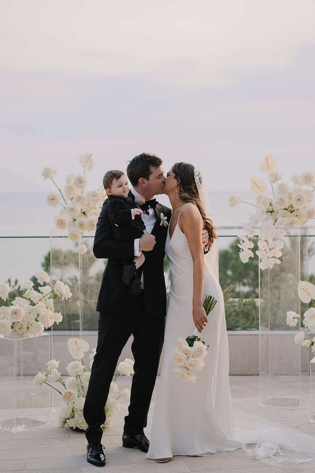 Bride and groom sharing a kiss