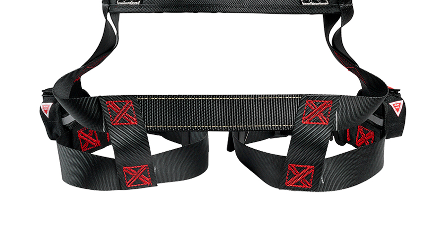 Reinforced webbing and stitching help this support strap resist wear, with edges and attachment points remaining important inspection areas.