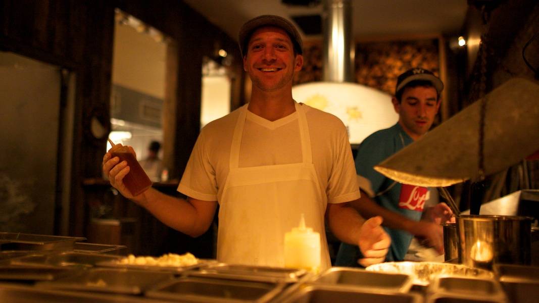 Mike in front of the pizza oven at Paulie Gee's circa 2010