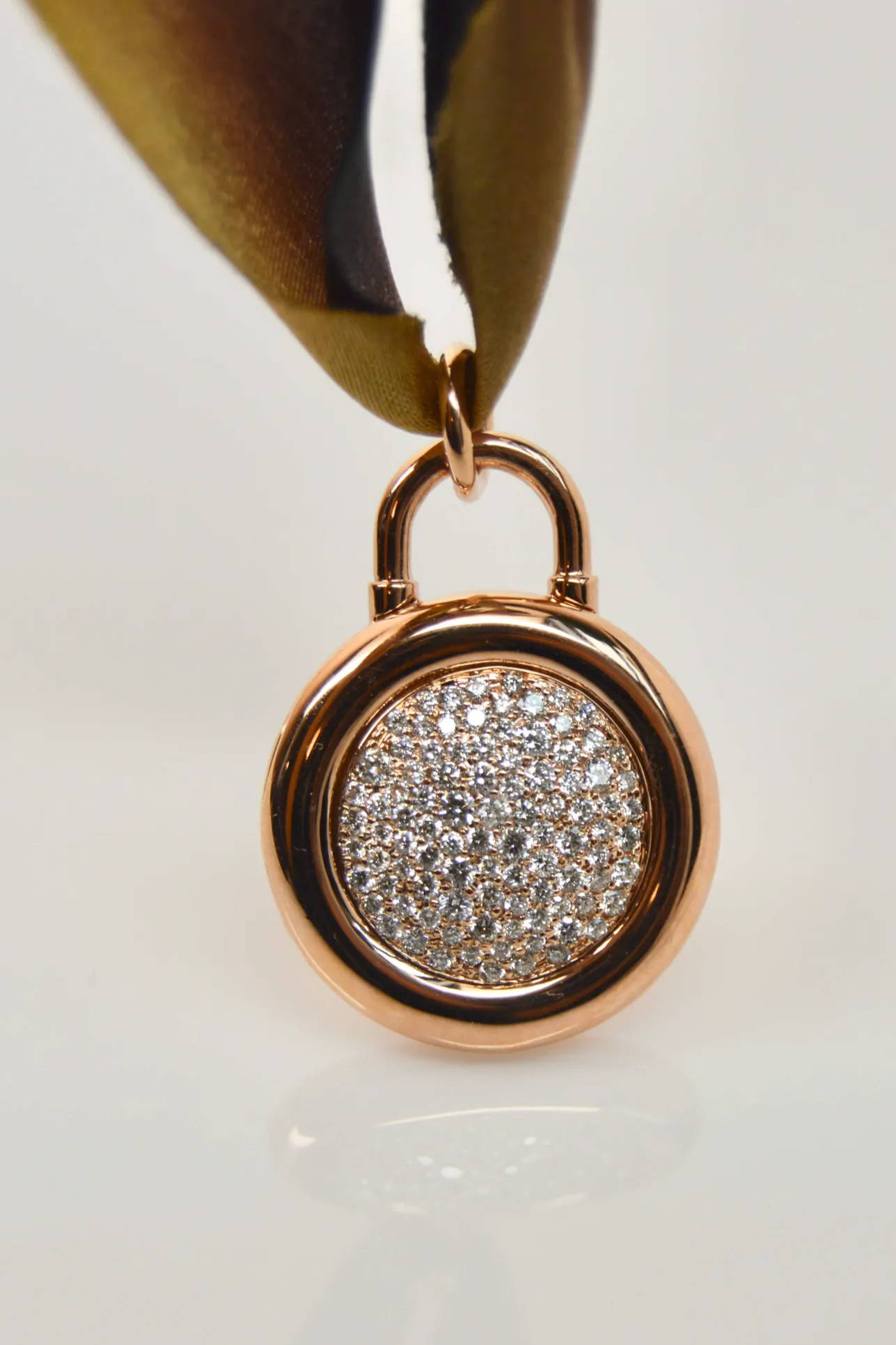 pave diamond locket close up