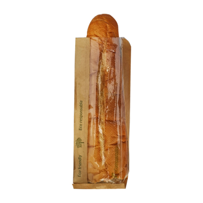 A long brown paper bag with a window containing a loaf of bread