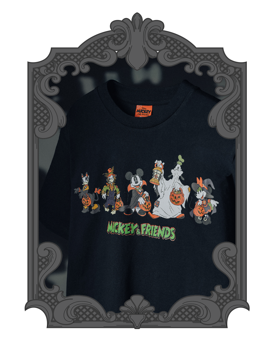 Black t-shirt featuring Mickey and friends in Halloween costumes.