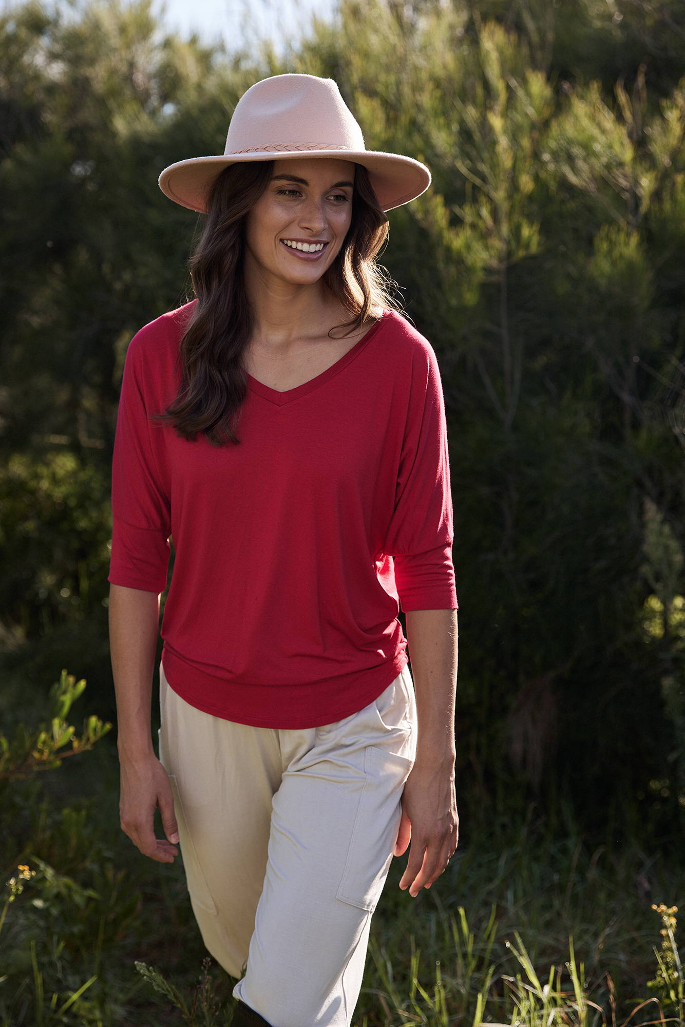 red three quarter sleeve top with v neck
