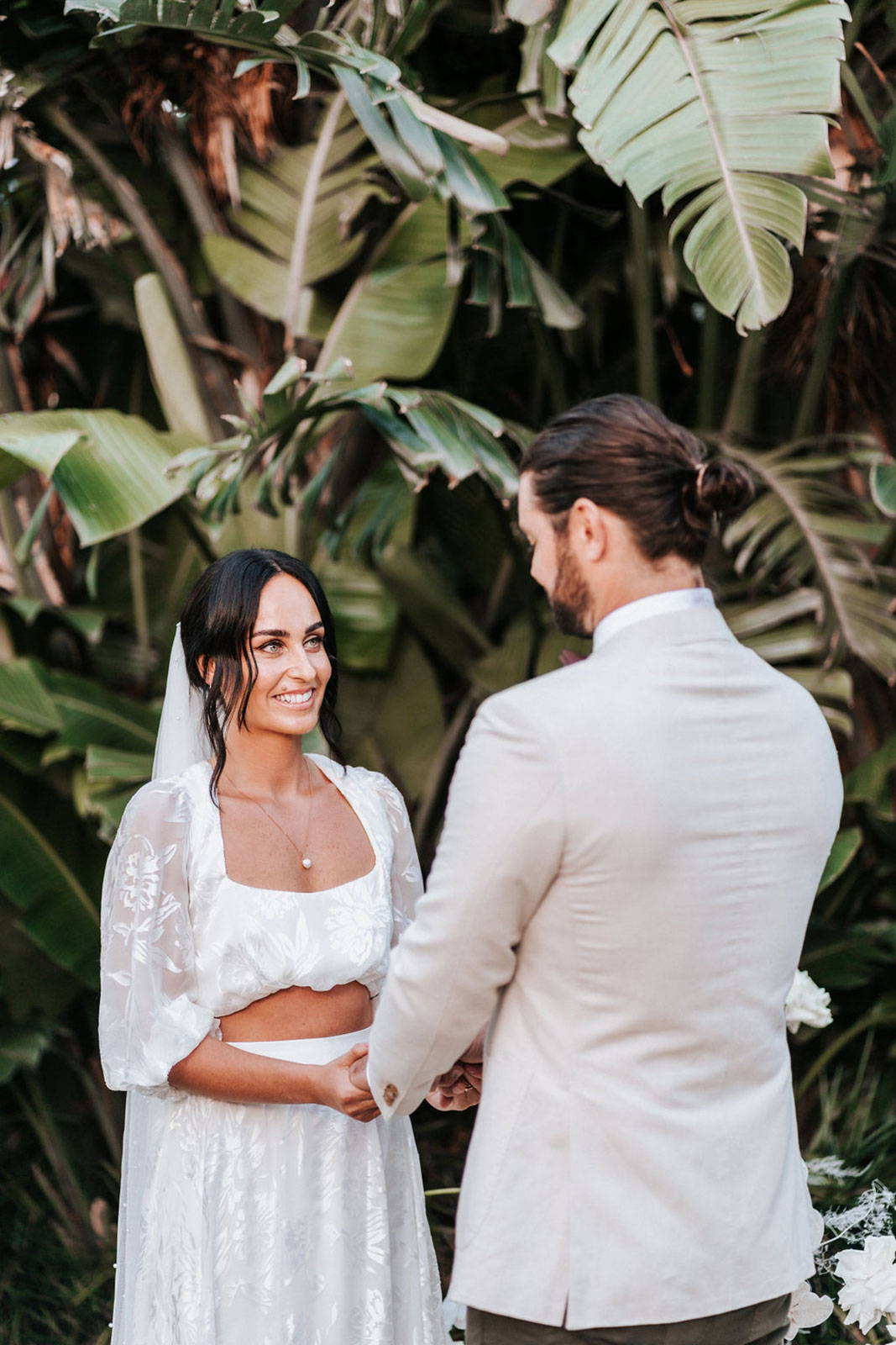 Bride and Groom holding hands