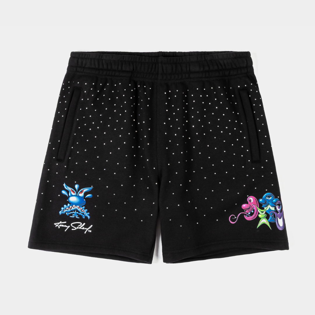 Black shorts with colorful designs and pockets.