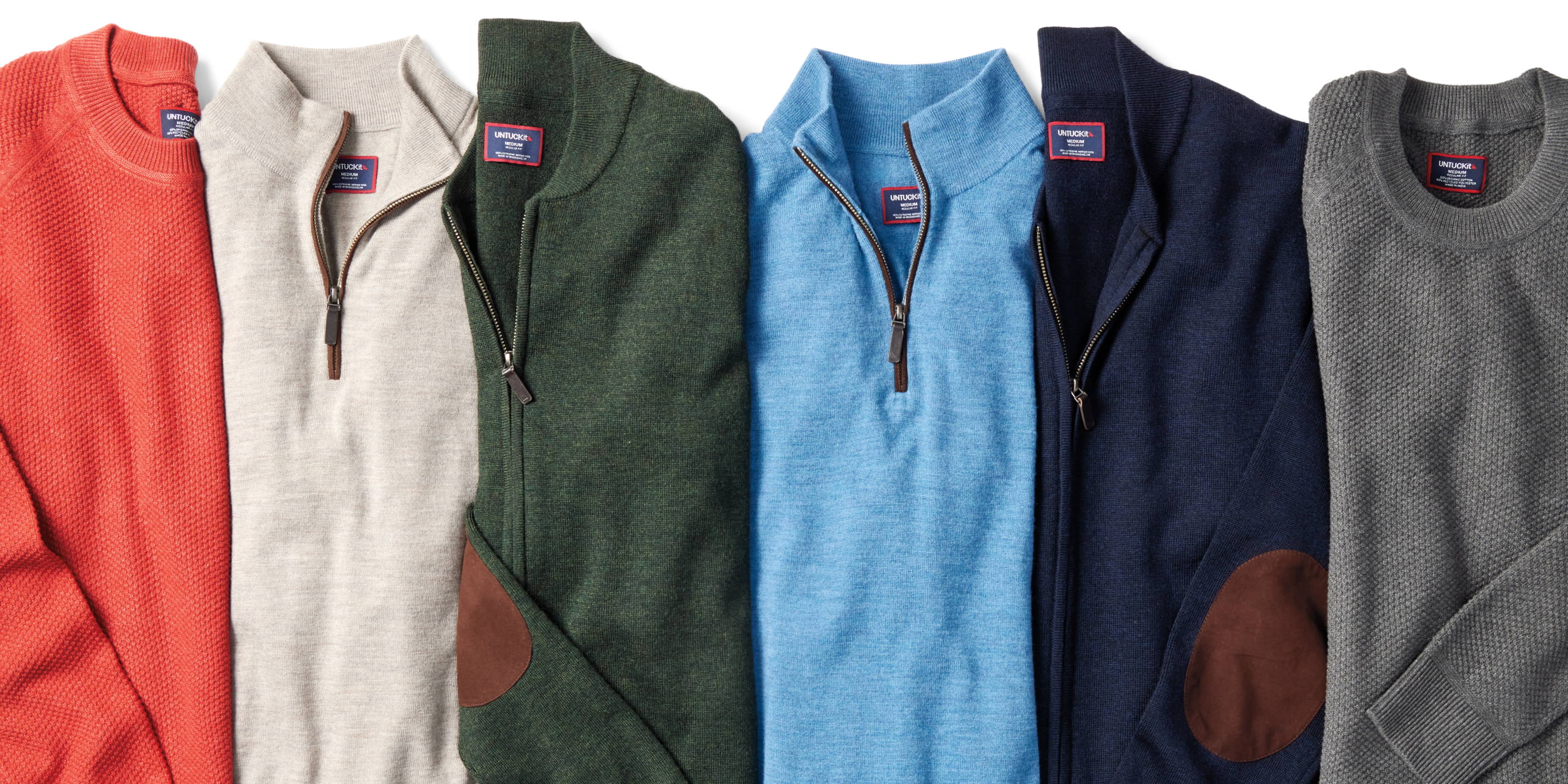 Collection of UNTUCKit sweaters in various colors. 