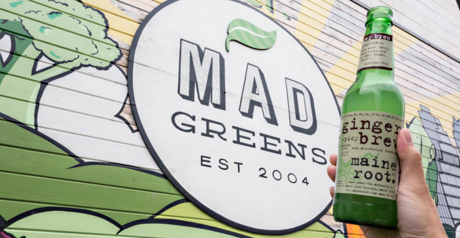 Maine Root Ginger Brew in front of Mad Greens