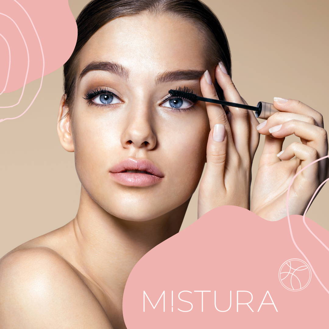 Woman applying Mistura Beauty Eye Makeup. (Ultimate Volume Mascara)