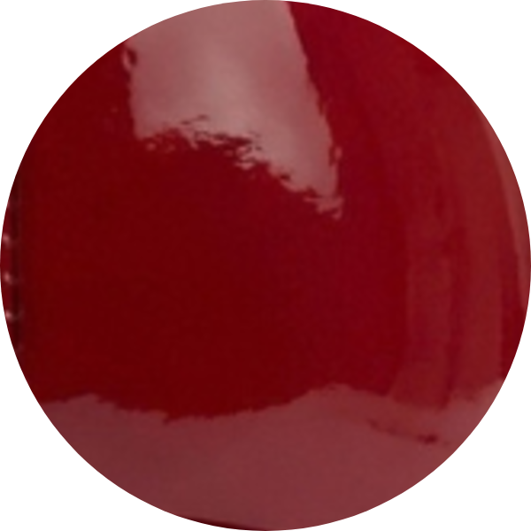 Glossy red circular surface.