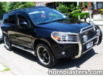 Front three-quarter Wesley's black 2008 Toyota RAV4 Limited chrome bull bar Batman emblem projector headlights New York DUEN plate Conductor's Special 228H featured customer install gallery photo 1