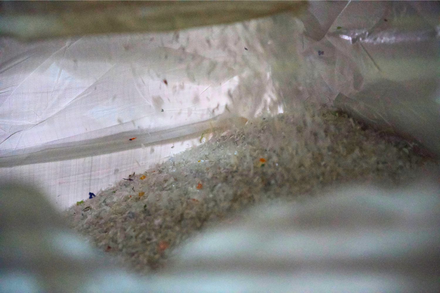 Close-up of a bag containing rice or grains.