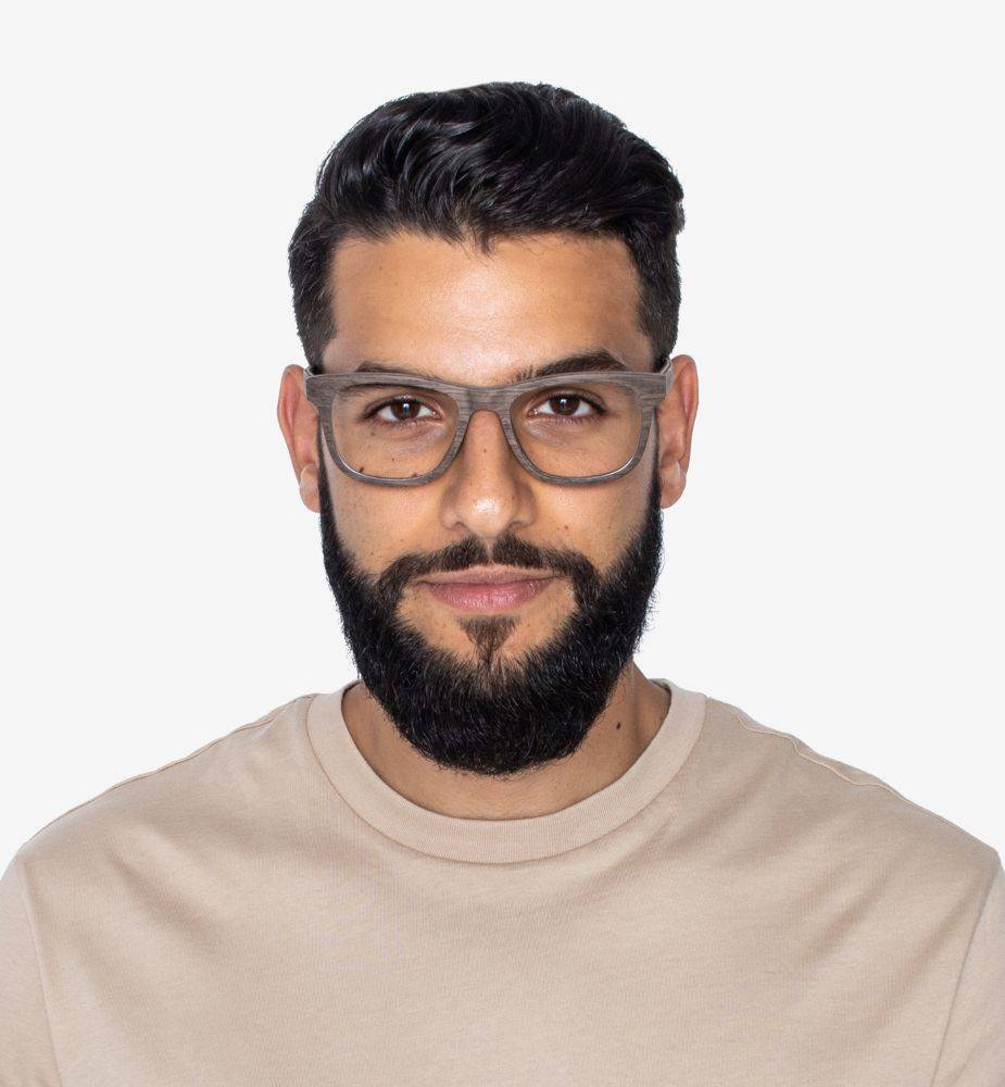 Man with small face wearing a beige sweater and Brave Brown Eyeglasses, Square glasses made with Walnut wood