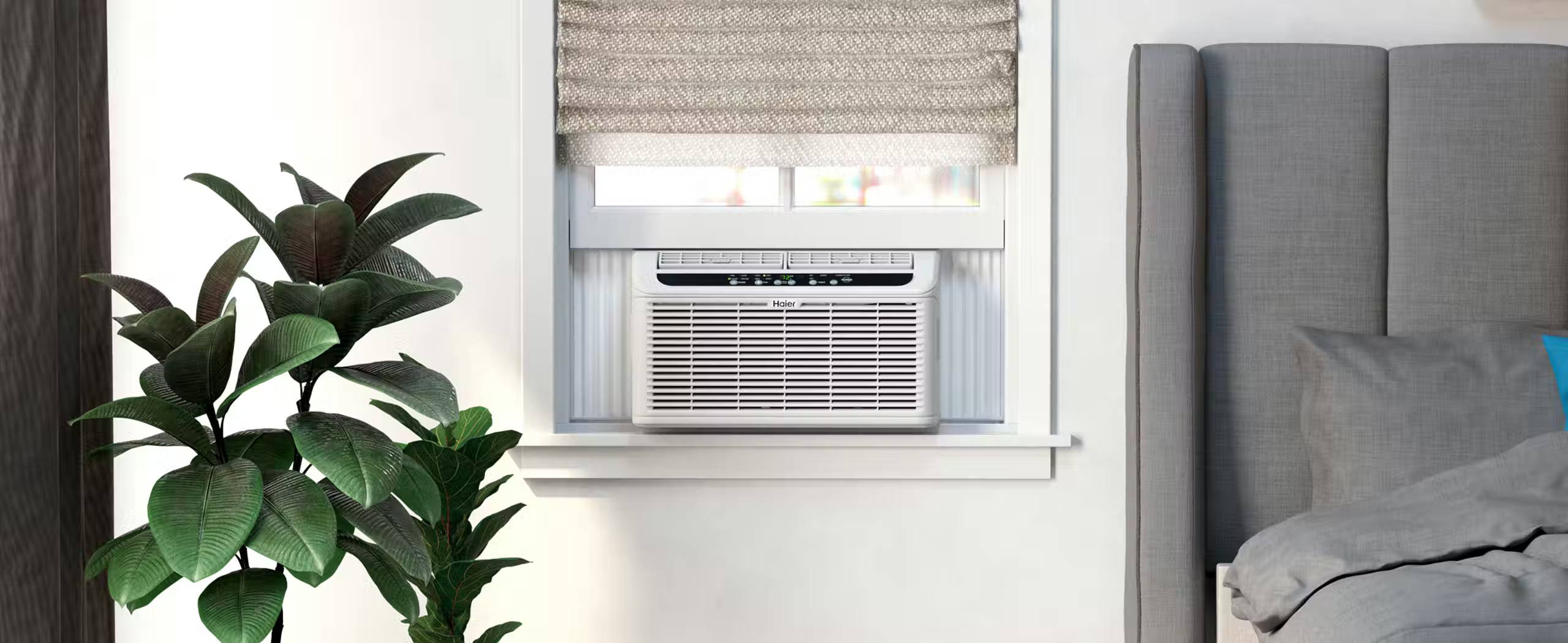 Haier window air conditioner in a bedroom window.