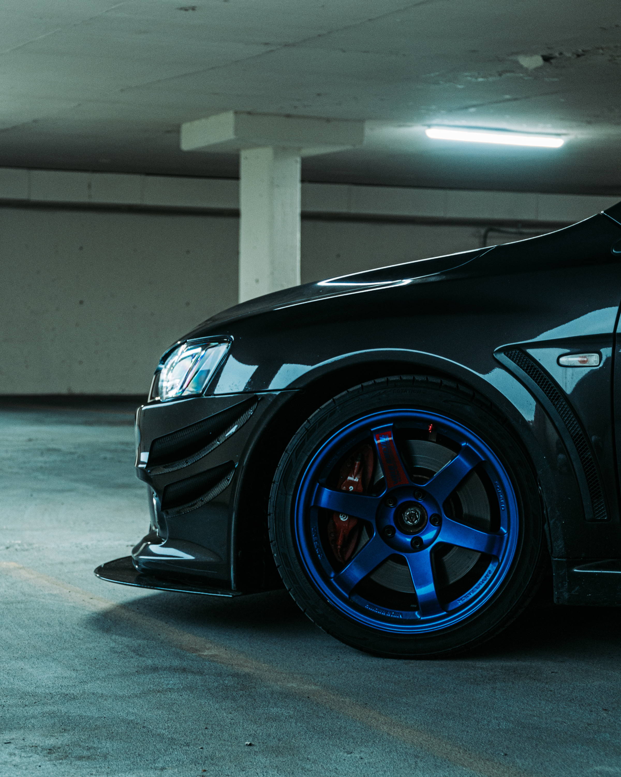 Evo X brake upgrade: Stoptech Slotted rotors, Raybestos Brake Pads, MAPerformance Braided Brake Lines, and Motul RBF660 fluid