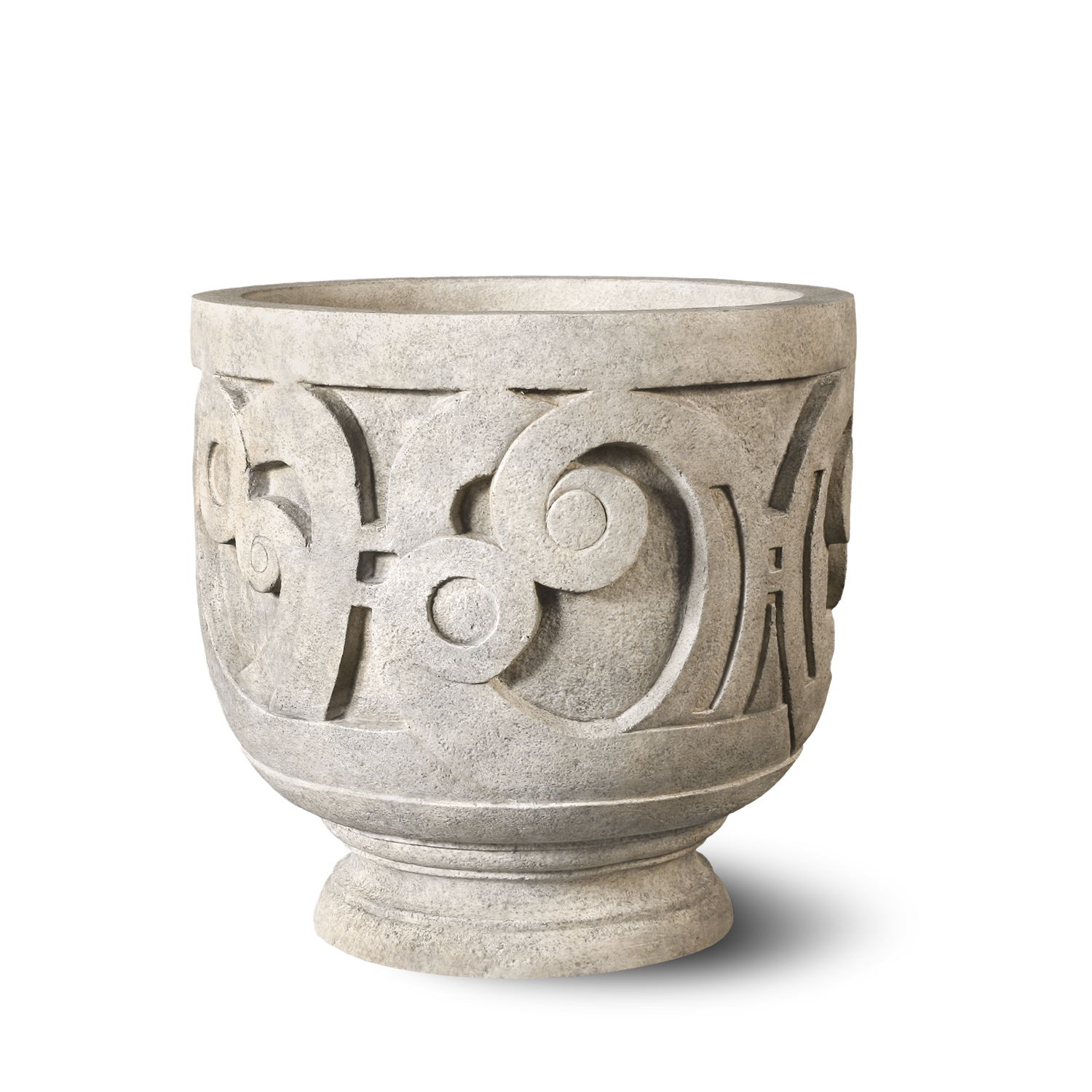 Decorative stone pot with intricate swirling patterns.