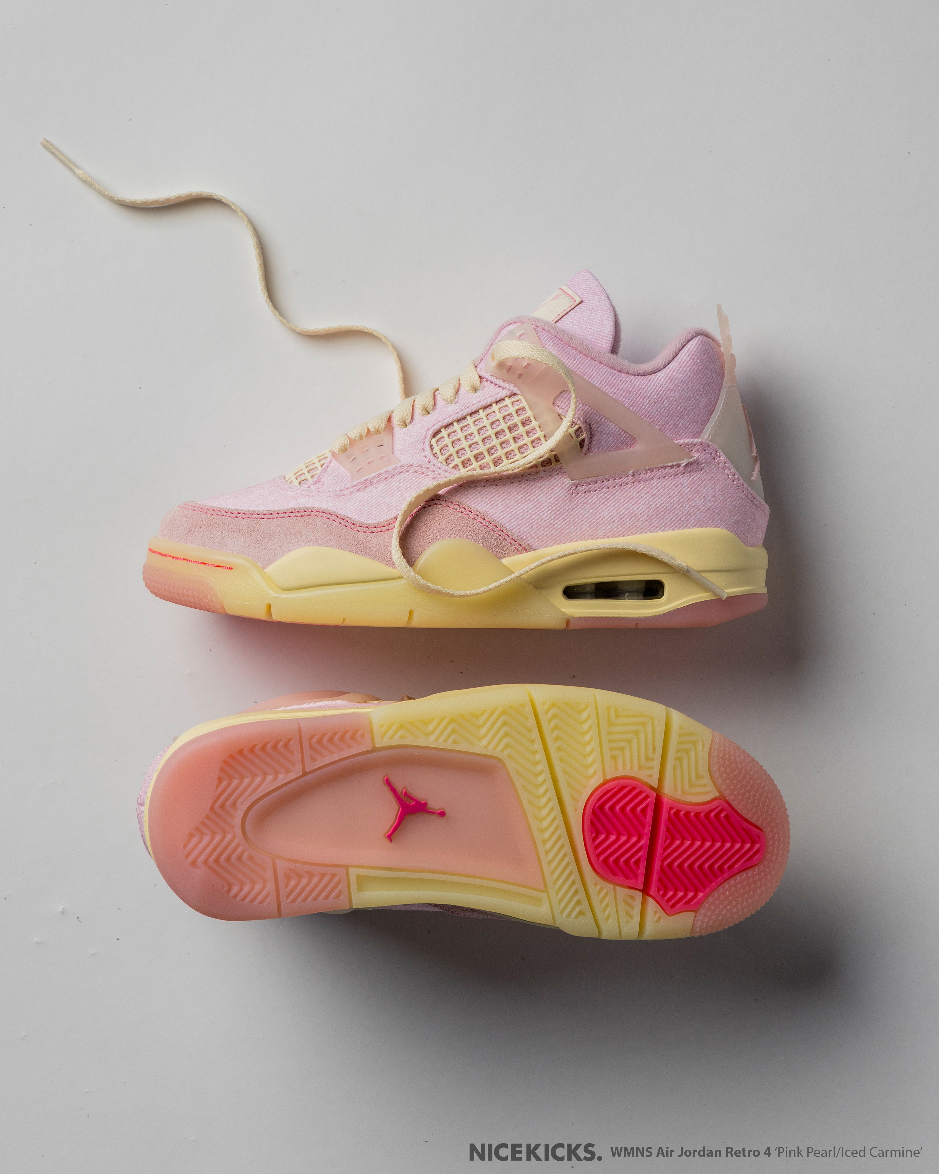 Pink and yellow sneakers displayed from above and below on a gray background.