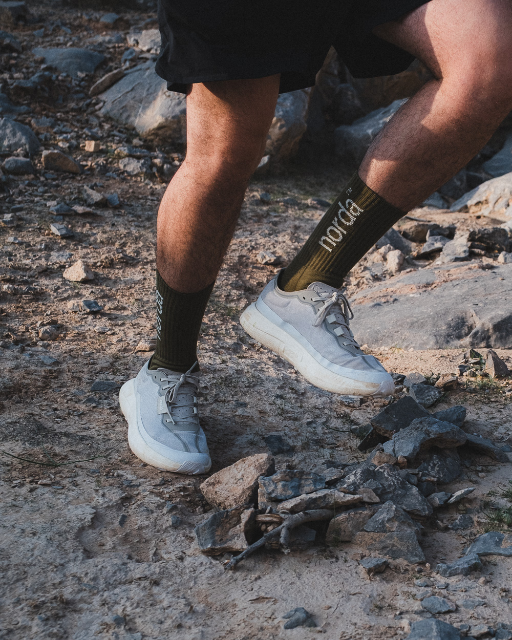 Runner testing the norda 005 on technical terrain in Jebel Jais