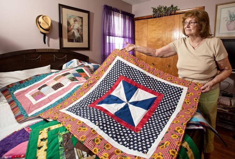 Front Royal woman sewing quilts for Ukrainians
