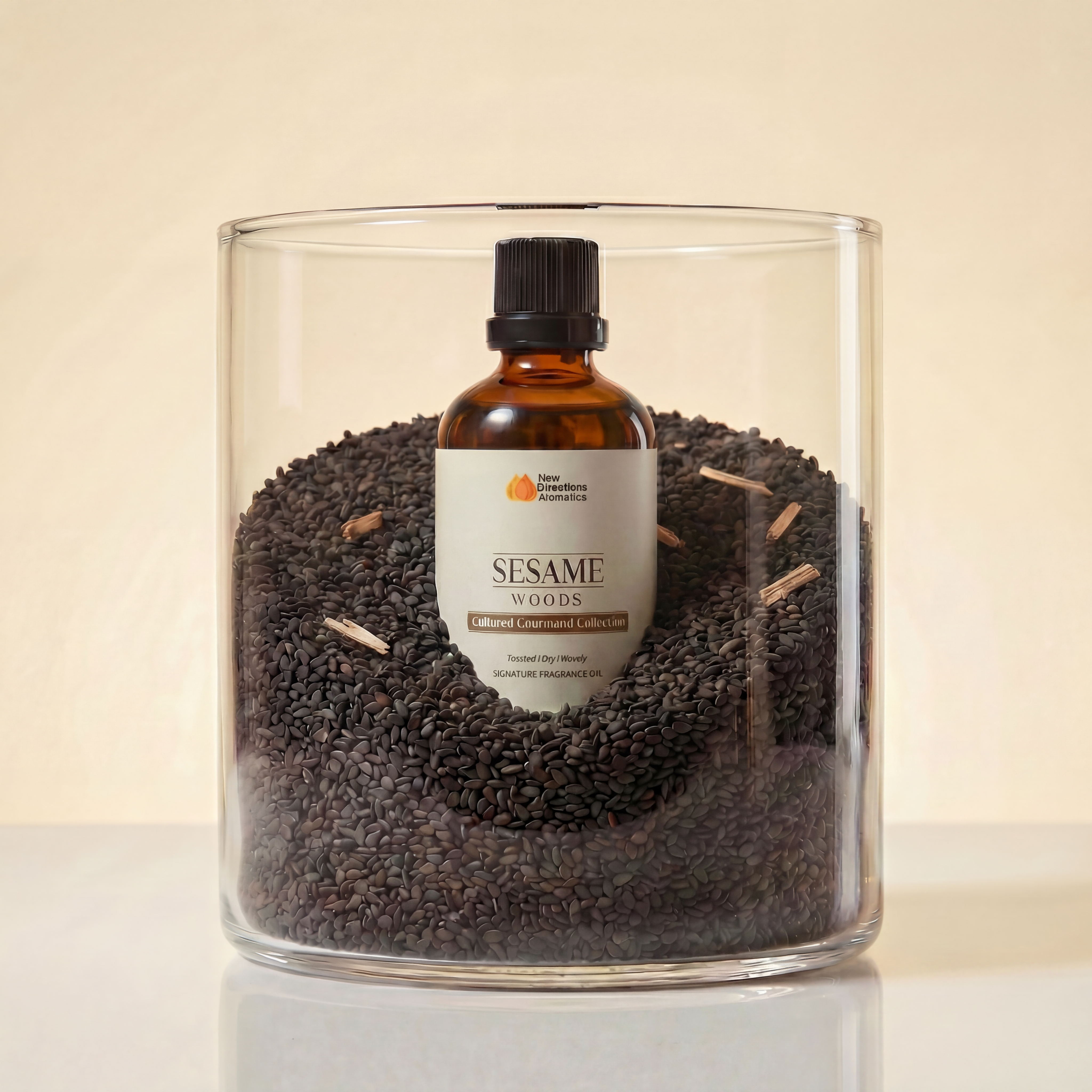 A bottle of sesame oil surrounded by black sesame seeds in a glass container.