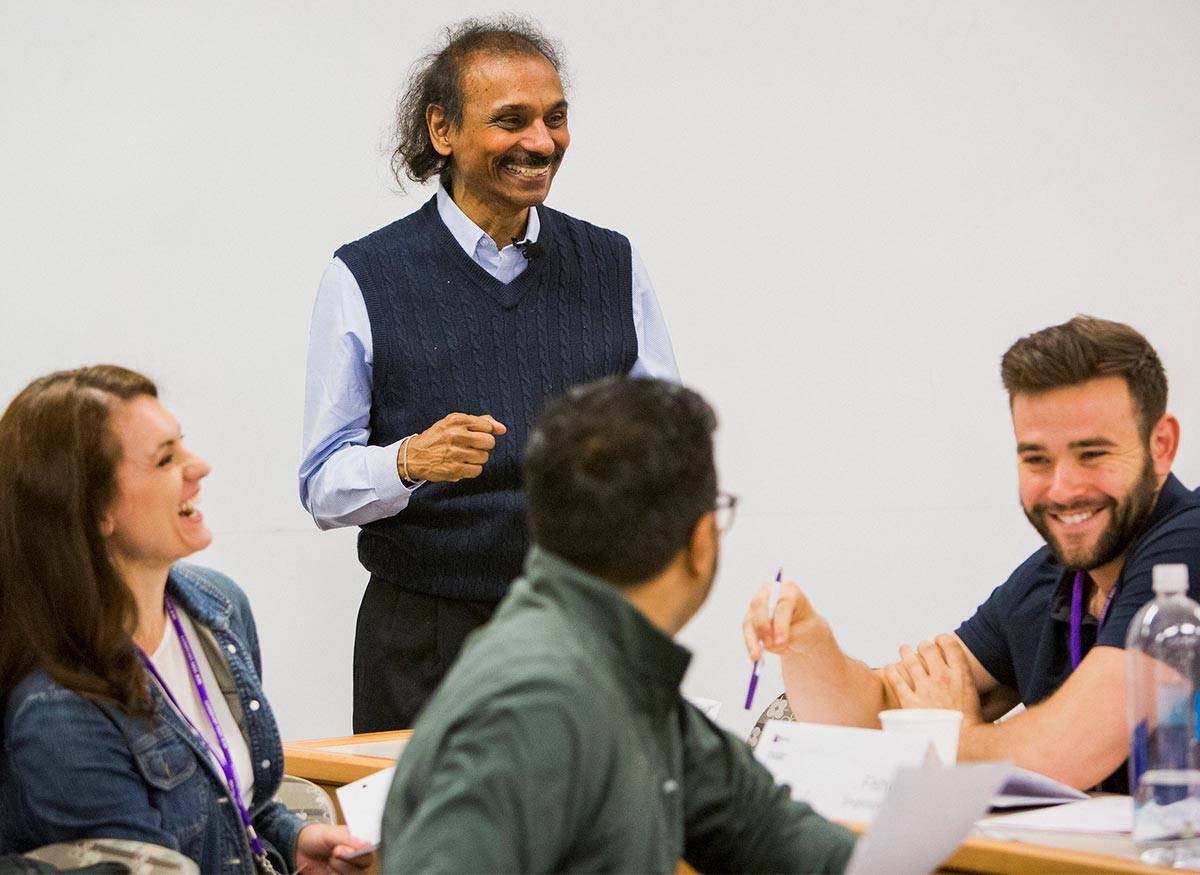 Kabi and group of participants smiling