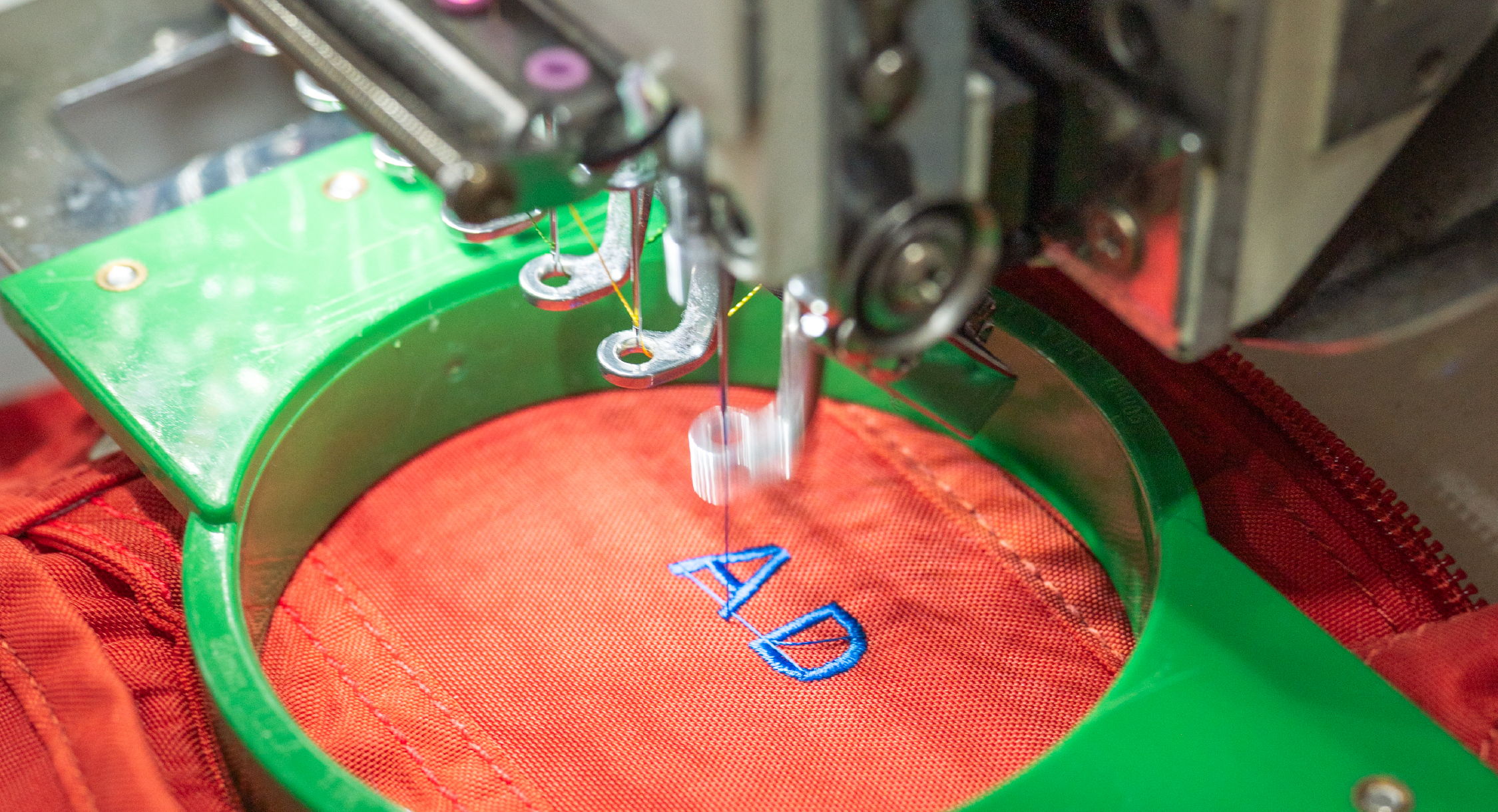 Embroidery machine stitching letters 