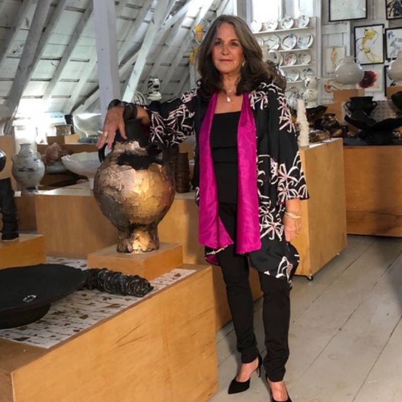 Connee Mayeron Cowles wearing black and white and pink reversible silk opera jacket over black stretch tank top and pants by Ala von Auersperg