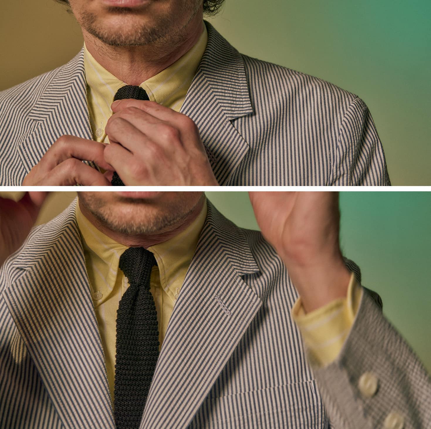 A man adjusting his tie, wearing a striped suit and yellow shirt.