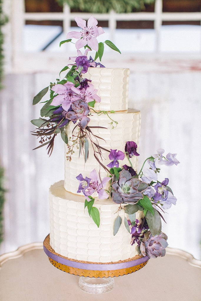 White cake with purple flowers
