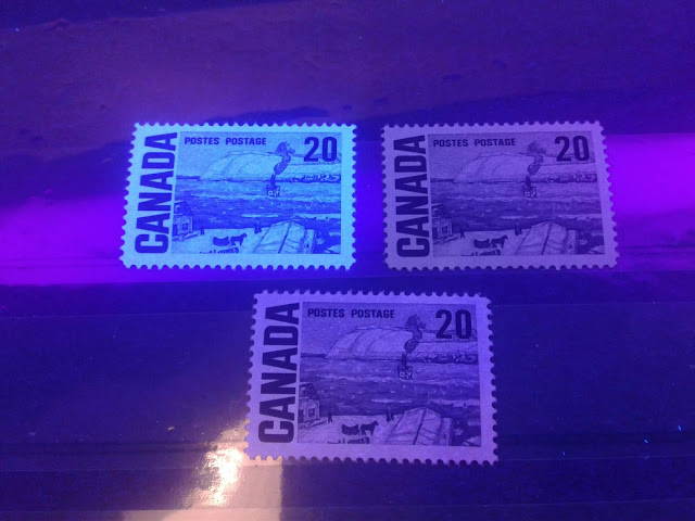 Three different paper types of the 20c Centennial issue of Canada as seen under ultraviolet light