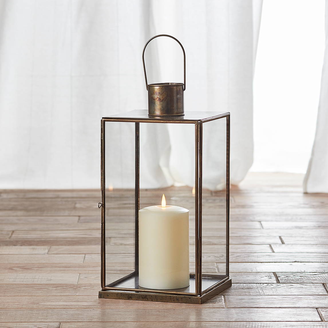Leif Artisan TruGlow lantern sat on floor