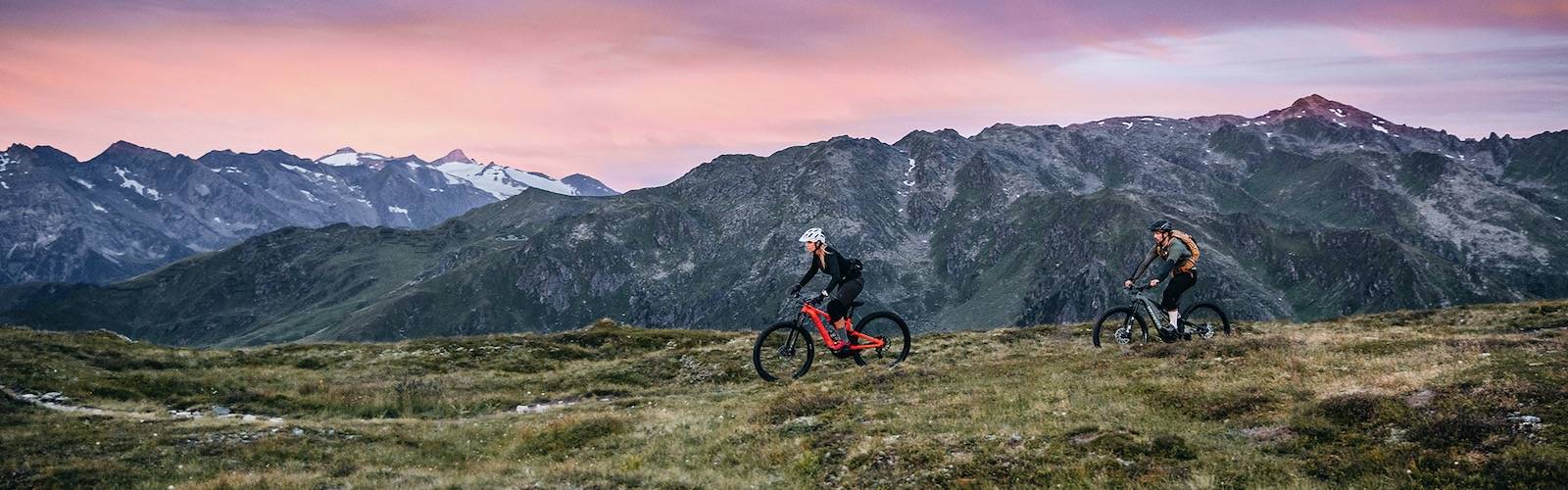 Riding trail bikes in the mountains. 